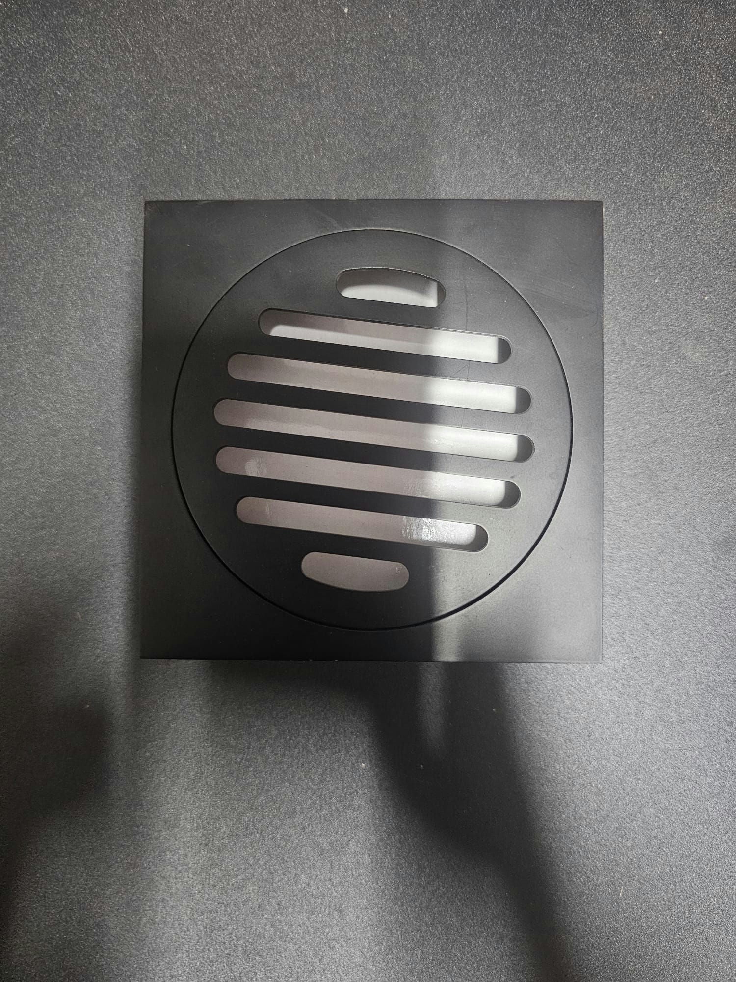 Black 110mm bathroom drain